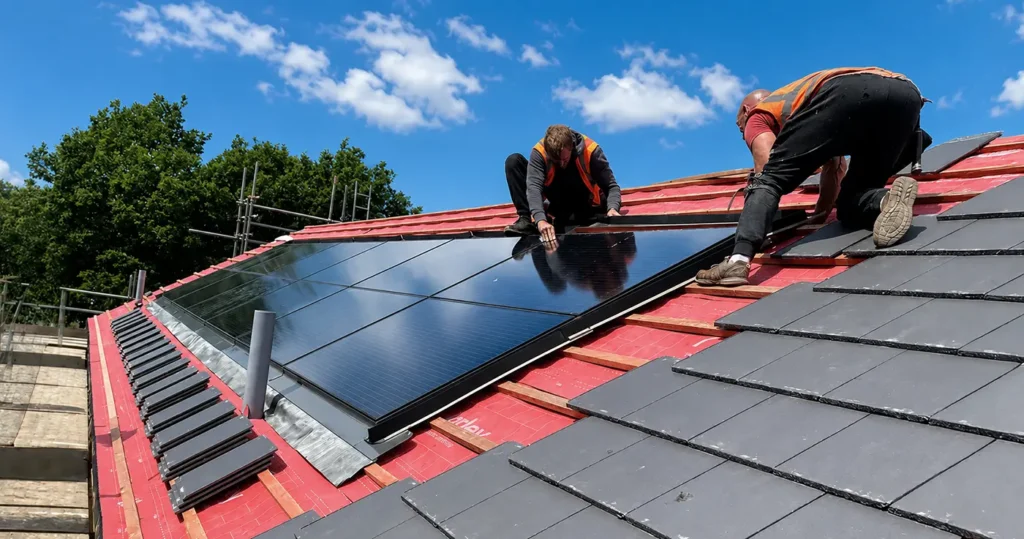 MCS certified Speedy Solar installer fitting panels on a Scottish home